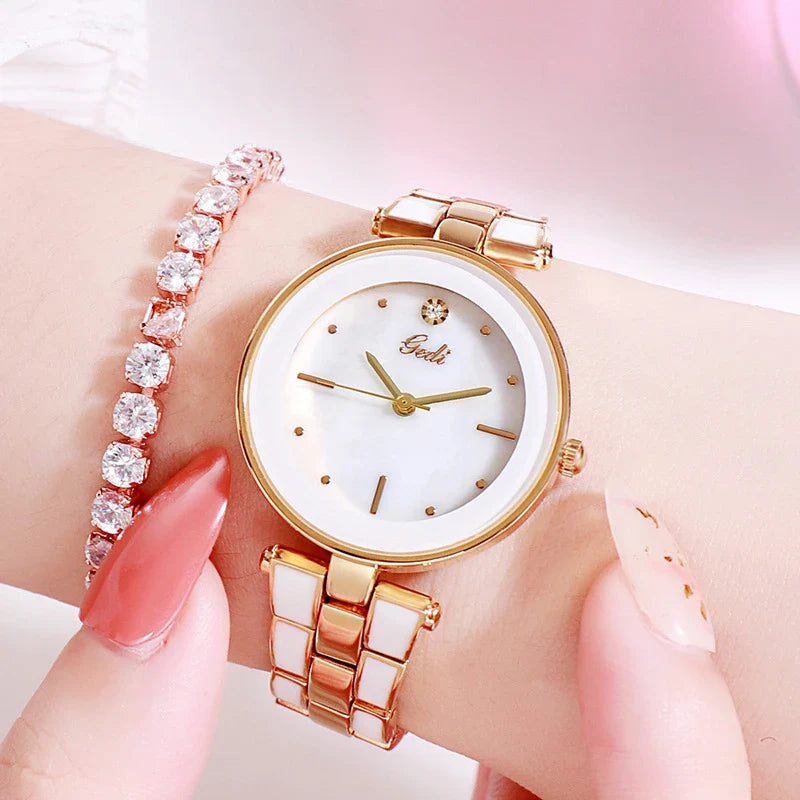 Trendha Ladies Watch with a sleek 30mm dial, screw-down crown, and stainless steel strap in a stylish white and rose gold colour scheme