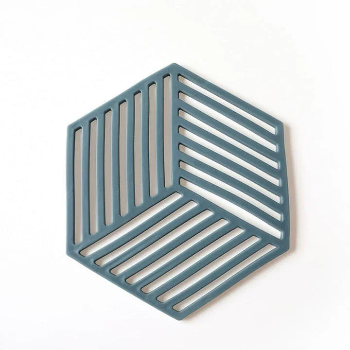 Geometric pattern cup coasters in a minimalist British design, made from durable rubber to protect surfaces