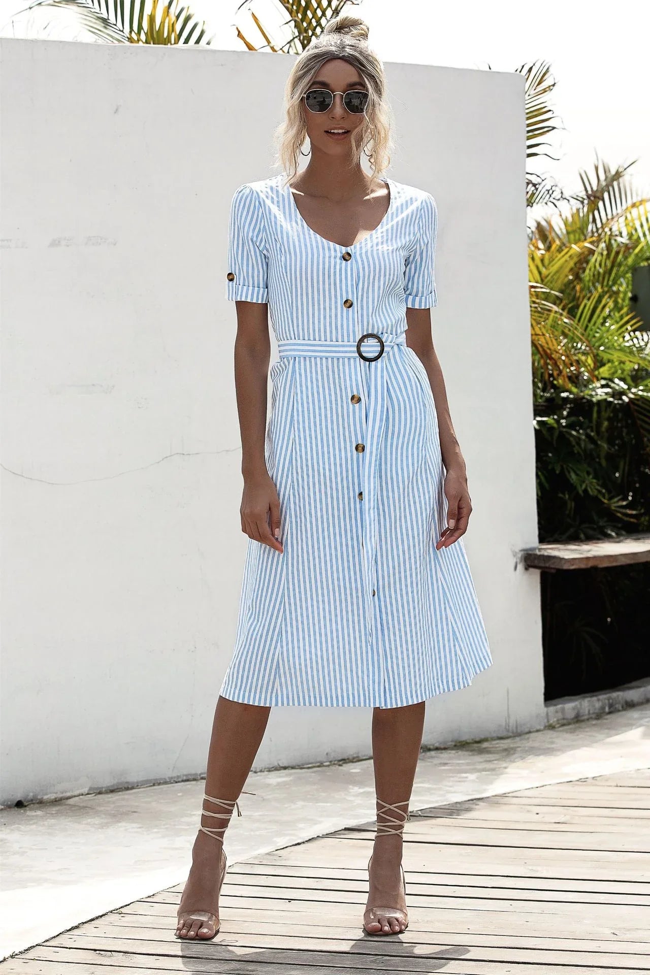 Stylish lace-up button dress in a soft, breathable cotton-blend fabric with a flattering middle waist silhouette