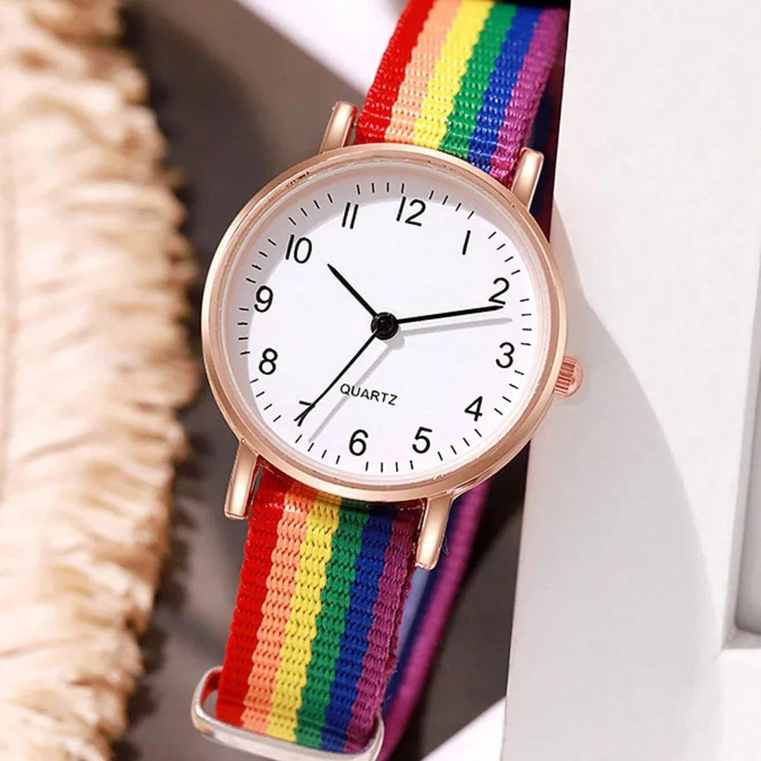 A stylish rainbow-coloured women's wristwatch with a quartz movement and an alloy case for elegant and durable design.