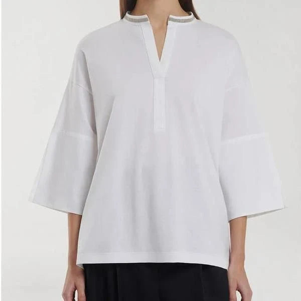 Stylish bead-embellished split-hem t-shirt in white, designed for the modern British woman with a touch of elegance and comfort.