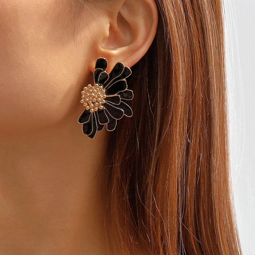 Vibrant, multi-coloured floral petal stud earrings with a blend of bohemian and modern influences