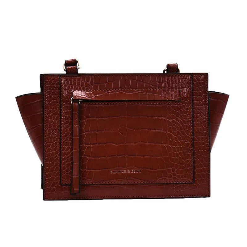 Premium British-designed messenger bag in wine red colour, featuring a spacious and stylish design with a single strap for comfortable carrying.