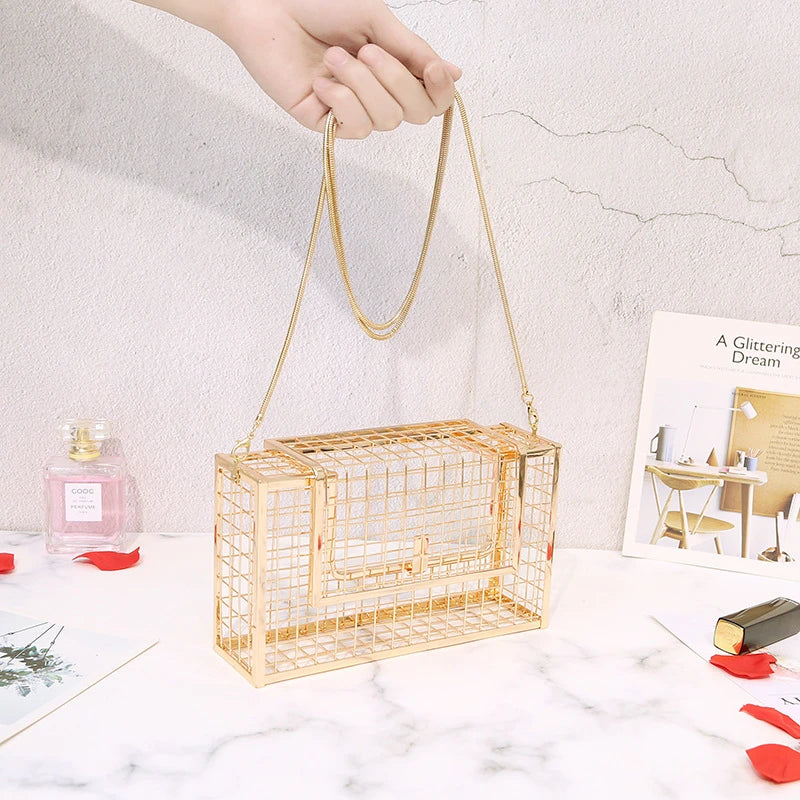A sophisticated British-designed metal mesh clutch bag with a chain strap, available in various colours and chain styles