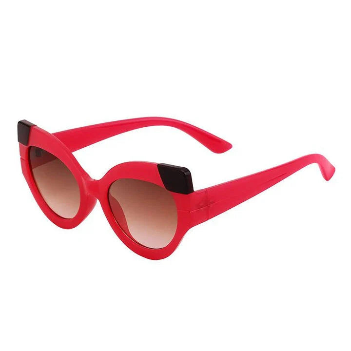 Iconic Cat Eye Retro Punk Sunglasses in black and gray, offering vintage charm and modern edge with UV400 protection