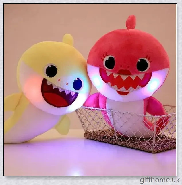 Soft and cuddly Baby Shark plush toy with captivating lights and music, perfect for young children's playtime