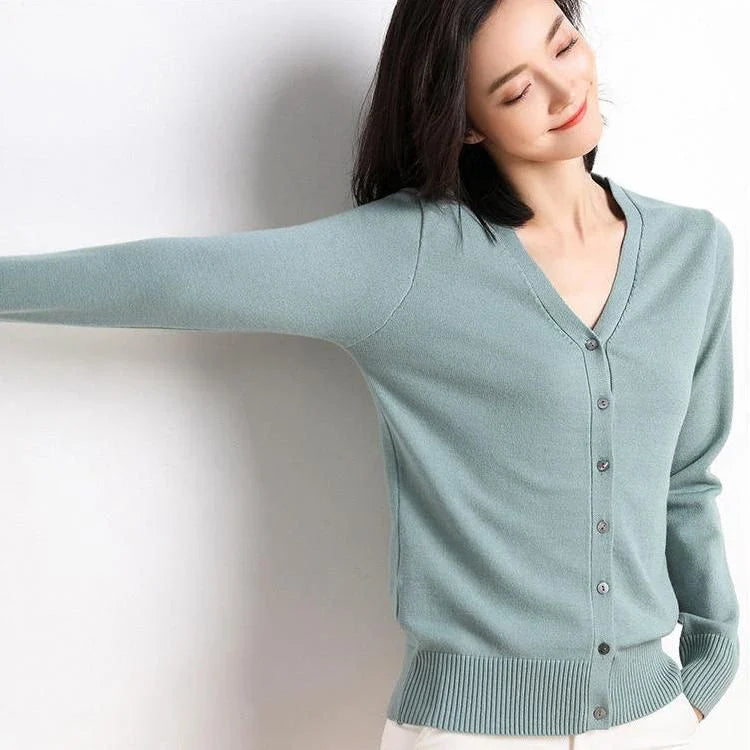 Chic v-neck single breasted cardigan in blue, green, and pink colours with a sophisticated and timeless design