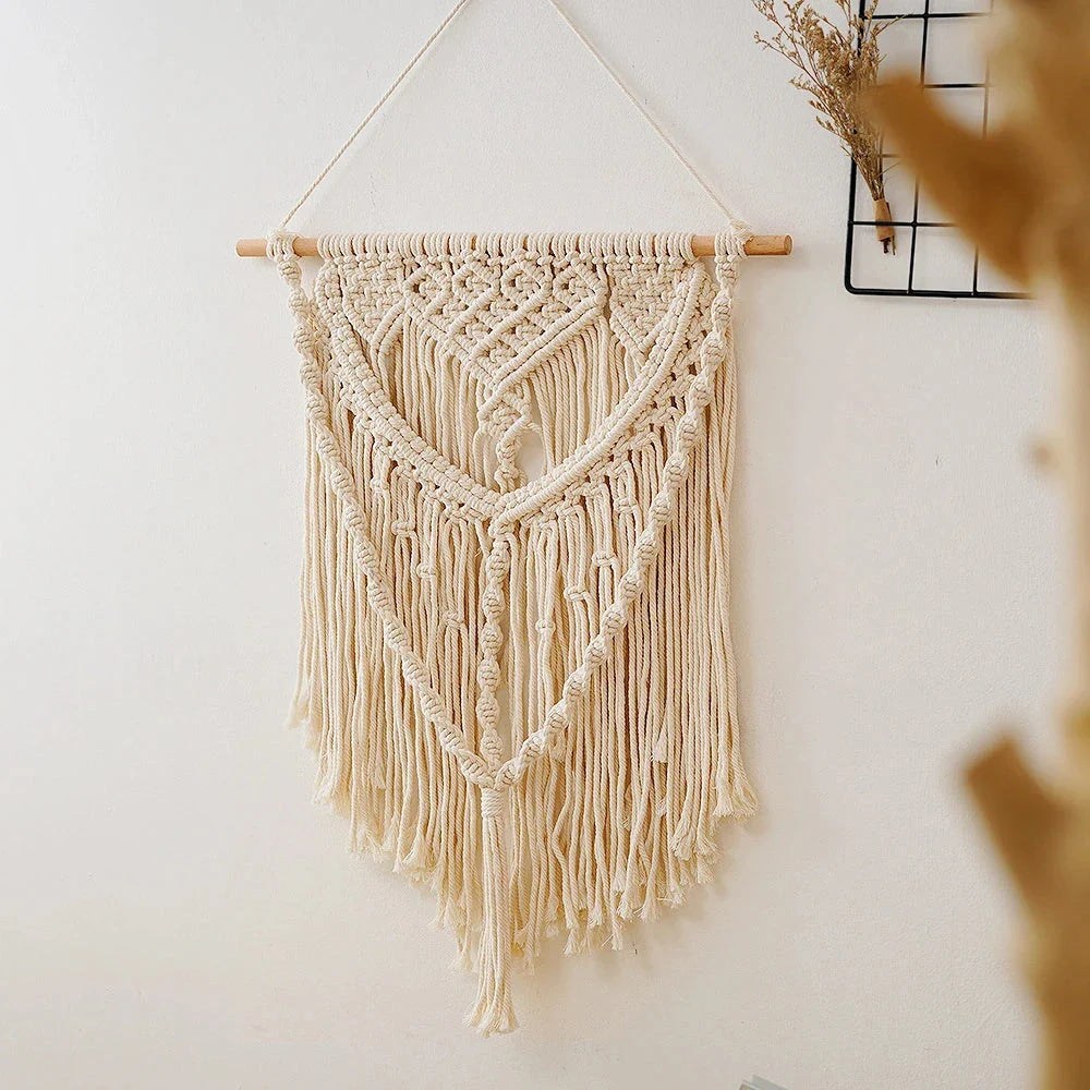 Elegant beige minimalist tapestry with unique oval shape and solid pattern, perfect for modern home decor