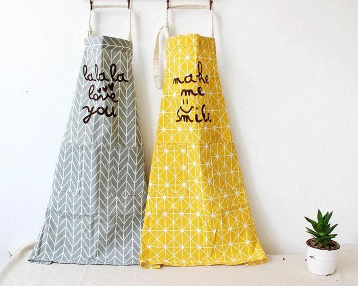 Premium cotton printed kitchen apron with floral design, offering full coverage and adjustable fit for the discerning UK homemaker