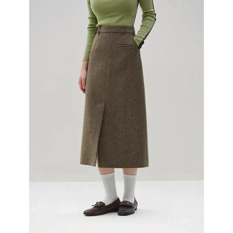 Sophisticated wool blazer and skirt set for professional women, featuring a chic double-breasted jacket and an elegant long skirt with a stylish front split