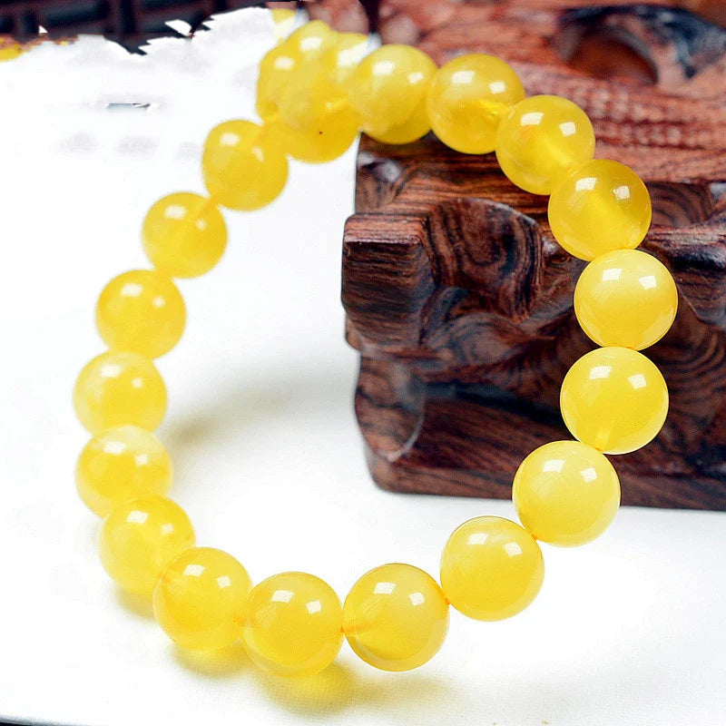 Elegant beeswax bracelets in a range of sizes, showcasing the natural beauty and premium craftsmanship of these premium Russian-inspired accessories.