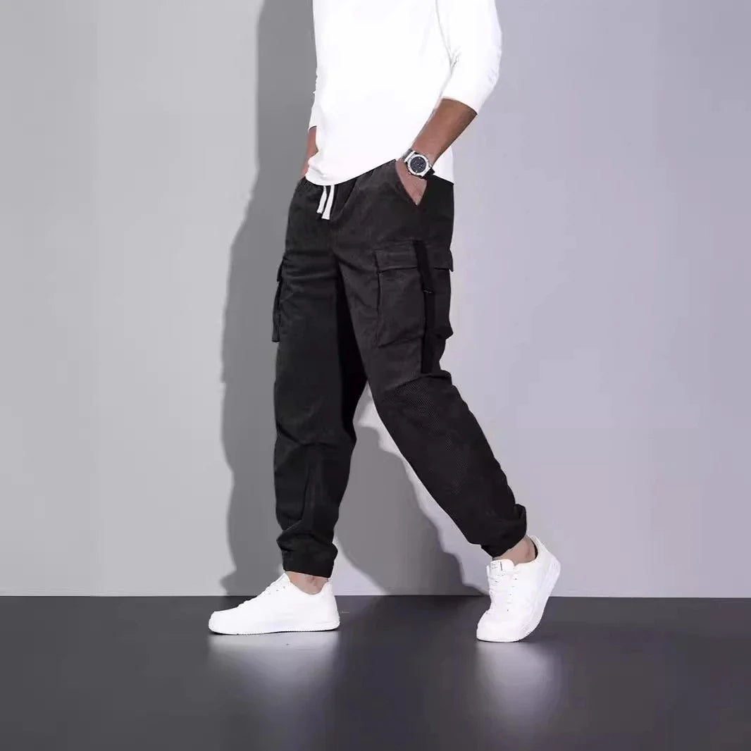 Premium British-inspired corduroy overalls with a relaxed, ankle-tied silhouette and stretchy, breathable fabric for all-day comfort and style.