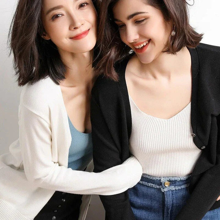 Chic v-neck single breasted cardigan in blue, green, and pink colours with a sophisticated and timeless design