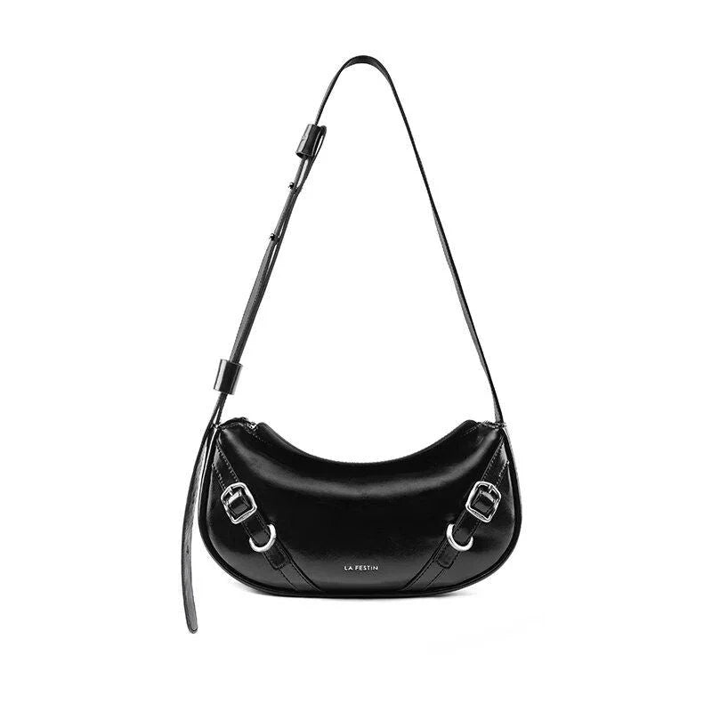 Elegant black shoulder and crossbody baguette bag made with premium split leather and synthetic lining