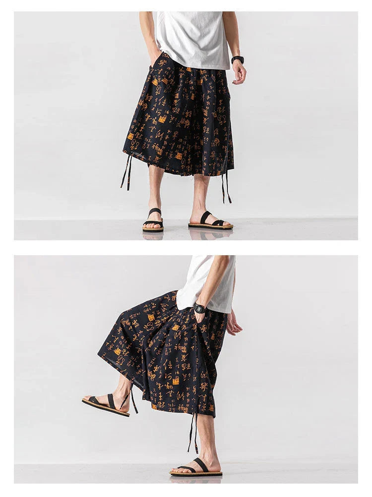 Men's loose-fitting Chinese-inspired cropped pants with a dragon or elephant floral pattern in navy blue, red, or coffee colours