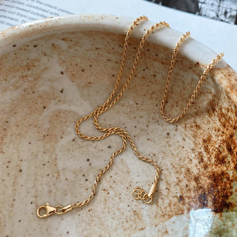 Sterling silver necklace with coastal-inspired fried dough twist design, handcrafted in the UK