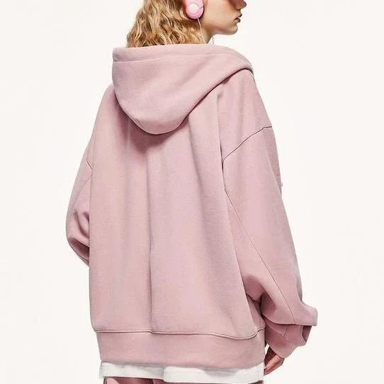 A premium British cotton and polyester hoodie jacket with a zip-up design, featuring a relaxed, oversized fit for everyday comfort and style.