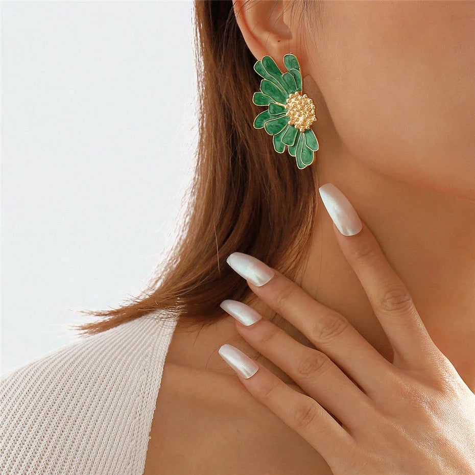 Vibrant, multi-coloured floral petal stud earrings with a blend of bohemian and modern influences