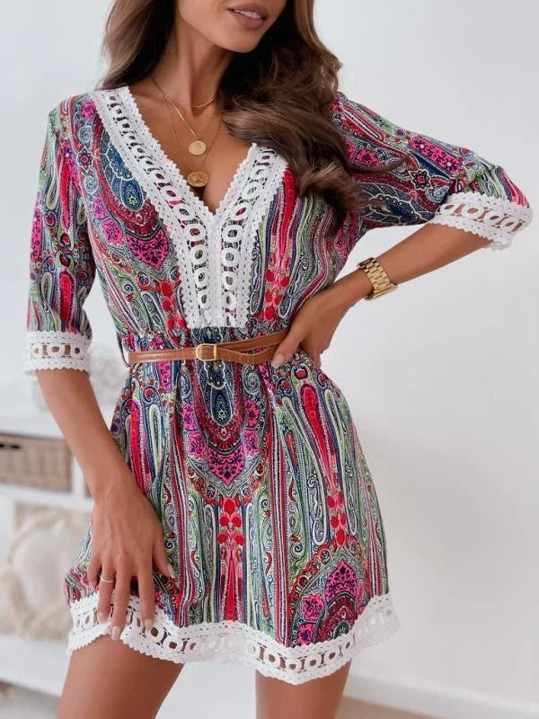 A stylish and elegant v-neck midi dress with lace trim, available in a range of classic British colours.