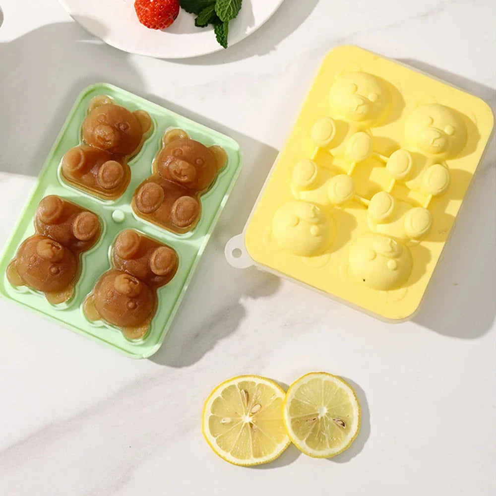 Yellow silicone bear-shaped ice cube mould for creating fun and creative frozen treats