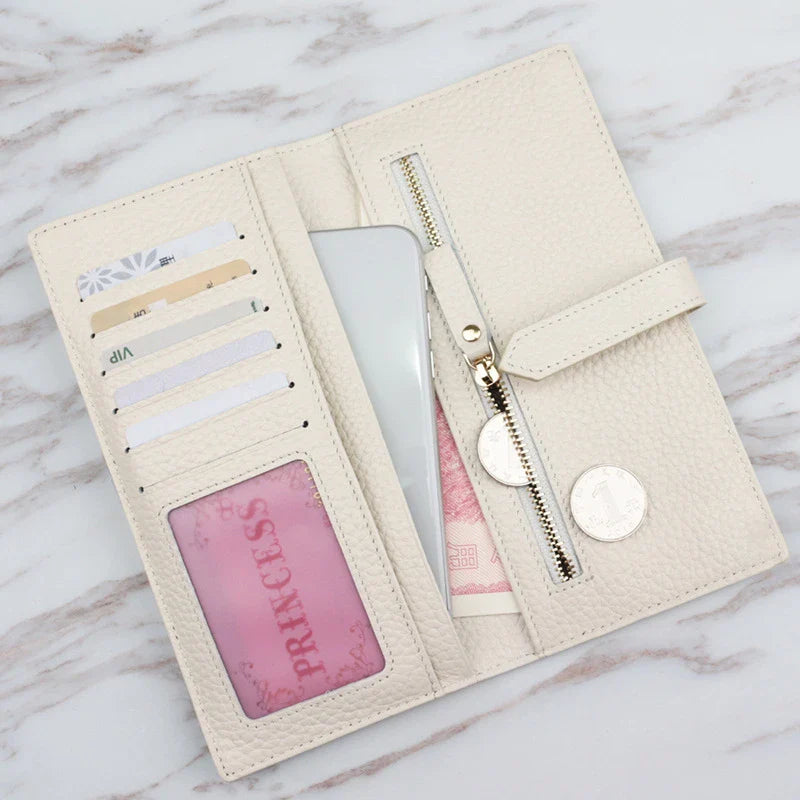 A stylish and practical long wallet made from premium leather, featuring a convenient drawstring closure to keep your essentials organised and secure.