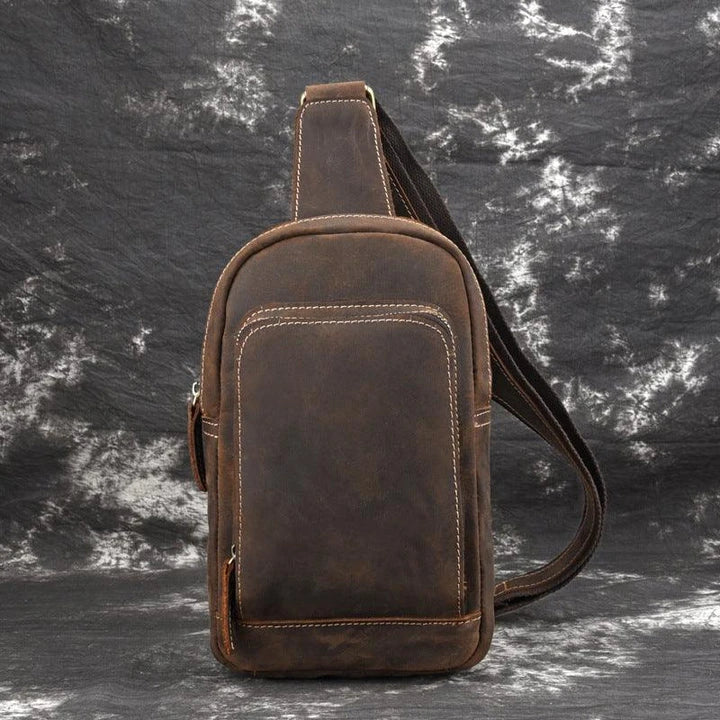 Vintage-inspired genuine leather briefcase with multiple compartments and secure zipper closure, ideal for modern commuters