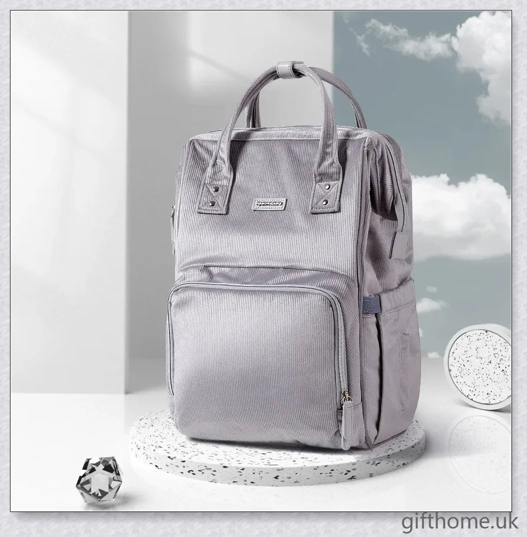 Premium polyester nappy backpack with multiple pockets and adjustable straps, perfect for modern British parents