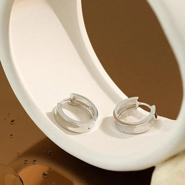 Pair of elegant 925 sterling silver geometric circle earrings in a trendy Korean style