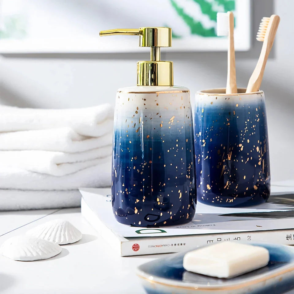 Luxury Ceramic Bathroom Accessory Set with shampoo dispenser, toothbrush cup, soap box, and versatile container in a modern, minimalist design