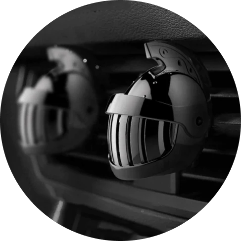 Premium medieval knight helmet-shaped air freshener made of aluminium alloy, designed to clip onto car air vents and refresh vehicle interiors