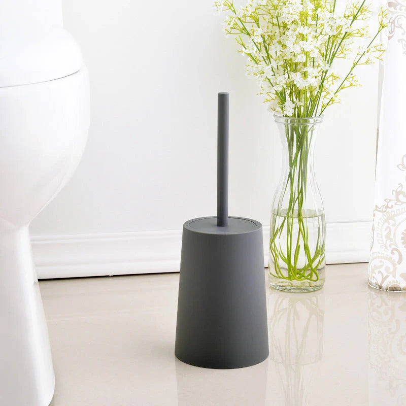 Elegant black toilet brush with stylish lid and base, designed for thorough cleaning and modern bathroom decor