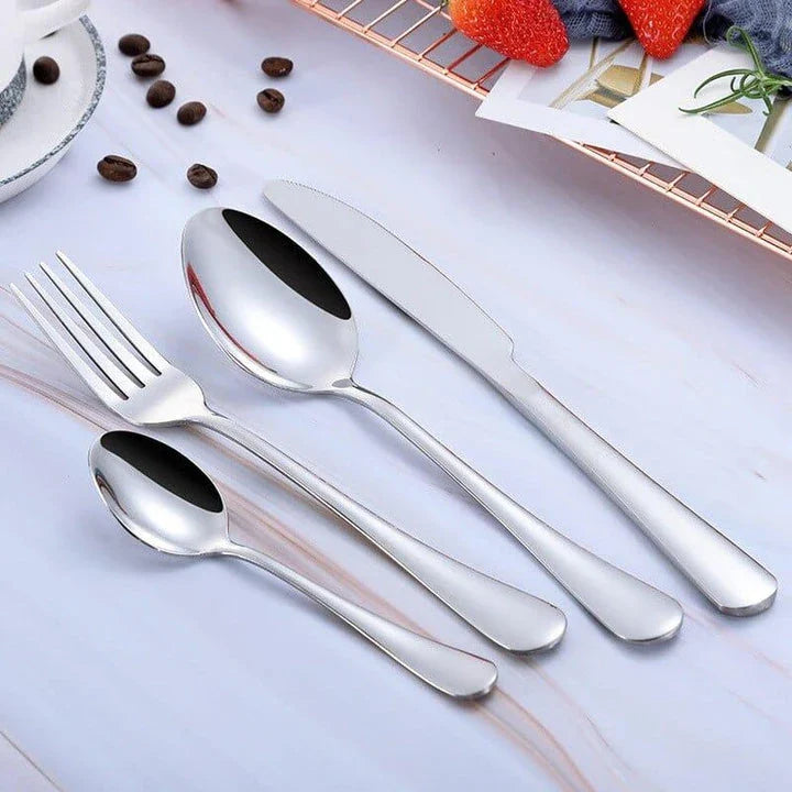 Premium eco-friendly stainless steel tableware set including knife, fork, spoon, and tea spoon in a sophisticated frosted finish