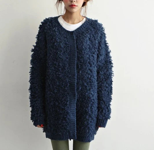 Women's cosy knitted jumper coat in a range of sophisticated colours, featuring a premium mohair blend and timeless British-inspired design.