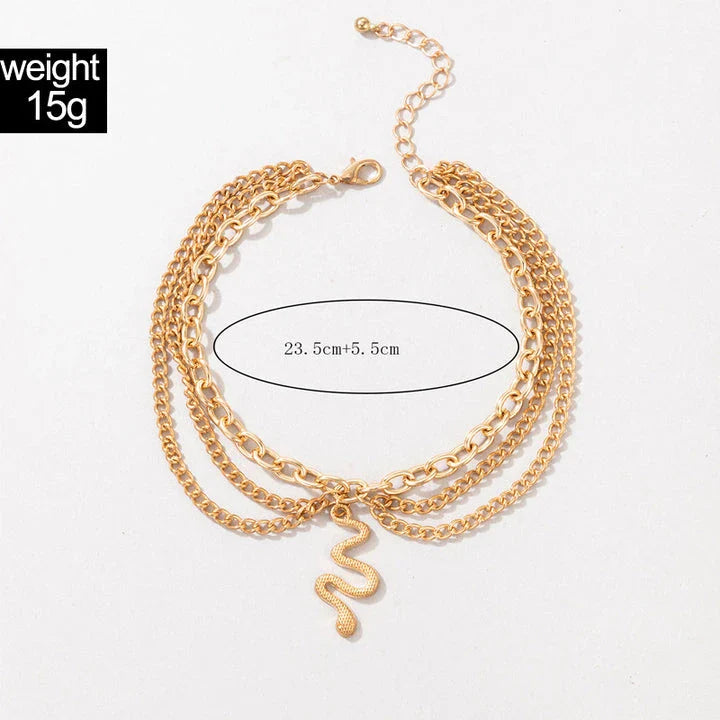 A stylish gold boho anklet with delightful tassels, starfish, and heart charms, perfect for summer outings and everyday wear.