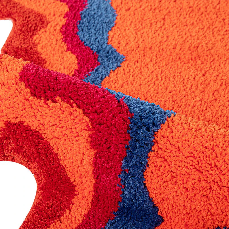 Vibrant 70s retro psychedelic tufted area rug with abstract design, perfect for adding vintage charm and modern style to your home