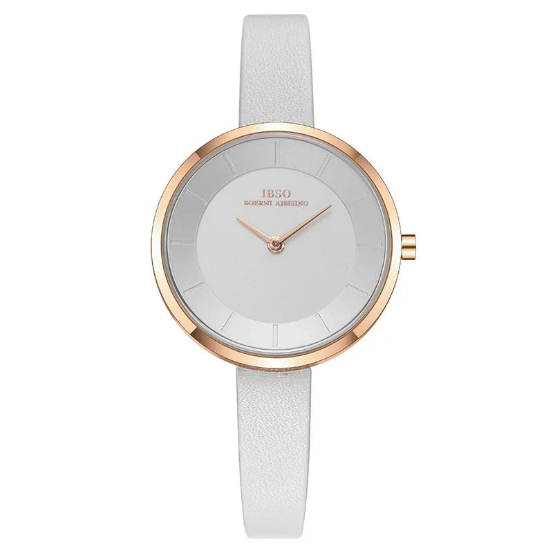 Stylish slim ladies' waterproof watch in various colours, including black, tan, grey, and white, with rose gold or silver accents.