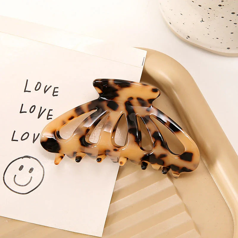 Chic geometric hollow stripes hair barrettes in beige colour, made from premium acetate for durable and comfortable wear