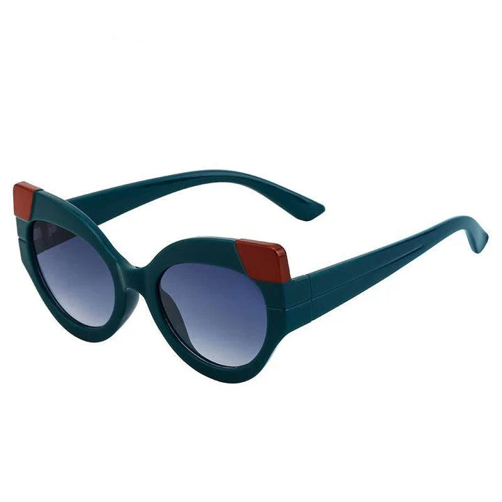 Iconic Cat Eye Retro Punk Sunglasses in black and gray, offering vintage charm and modern edge with UV400 protection