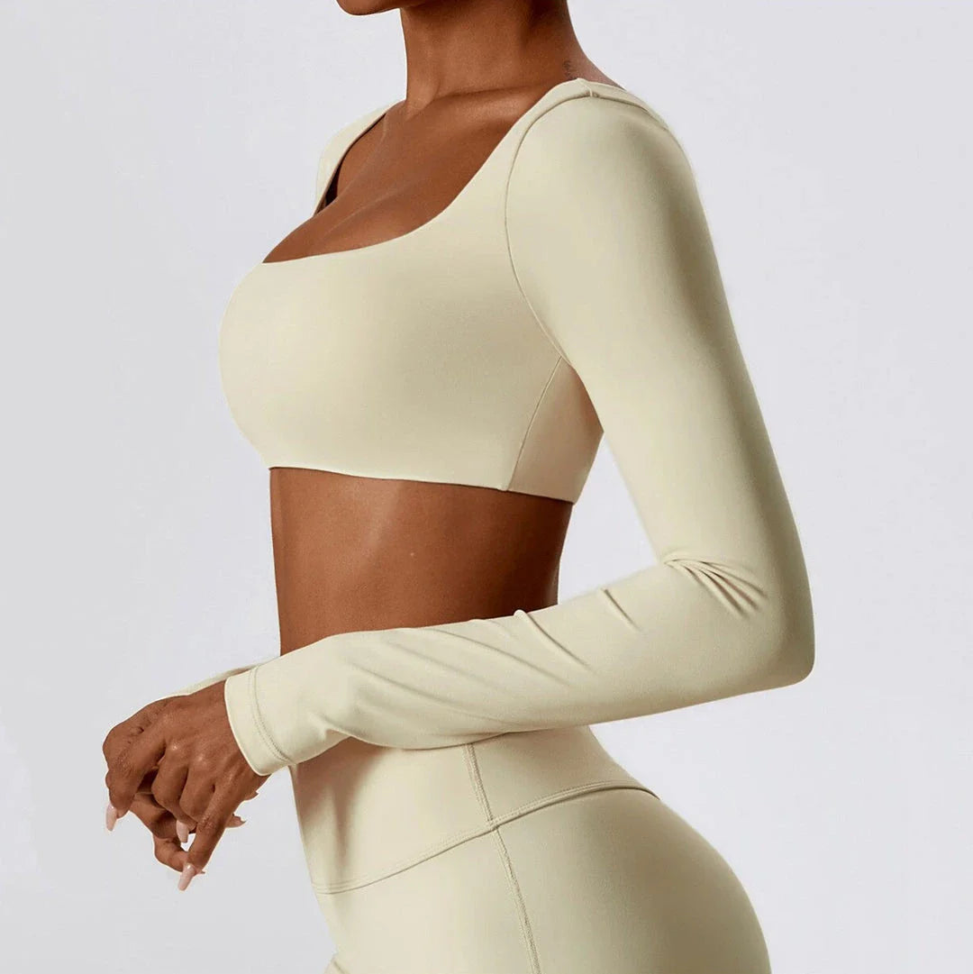 Stylish long sleeve crop top yoga shirt in green, designed for comfort and performance during workouts