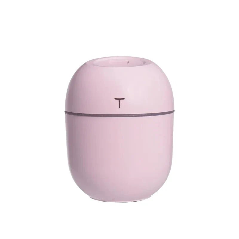 Compact ultrasonic humidifier and aroma diffuser with LED night lamp, available in white colour