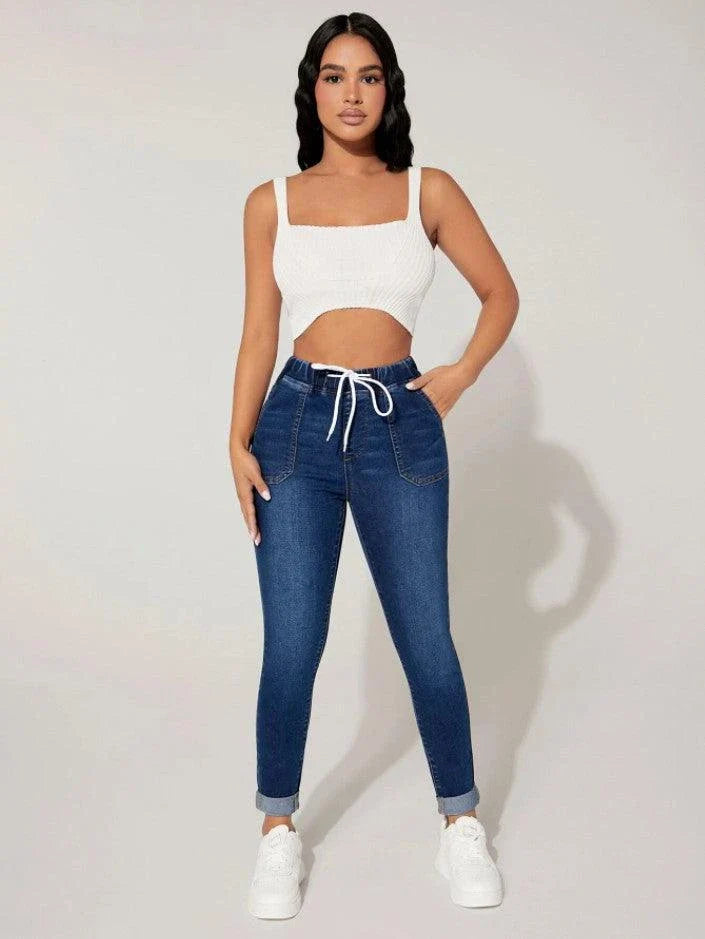 Premium navy blue drawstring waist skinny jeans with a vintage-inspired stone-washed finish