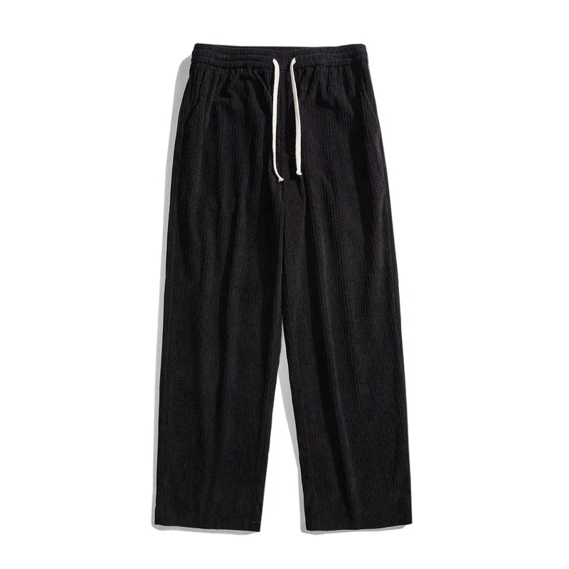 Premium fleece-lined corduroy trousers in a range of versatile colours, featuring a relaxed, straight-leg silhouette for a sophisticated, comfortable look.
