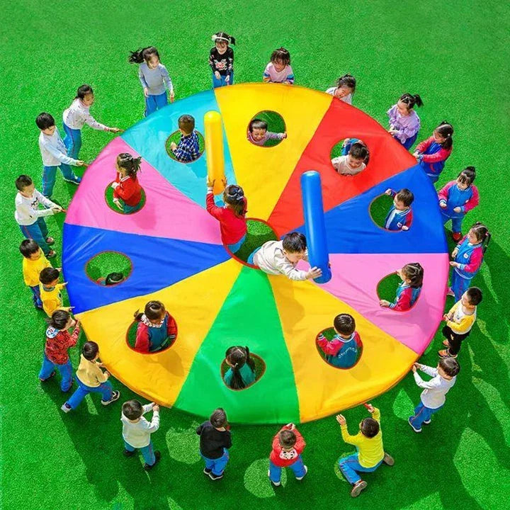 Vibrant rainbow-coloured parachute umbrella game for outdoor group activities and events
