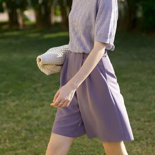 Elegant wide-leg shirred shorts for women, featuring a refined design and comfortable fit for the British summer