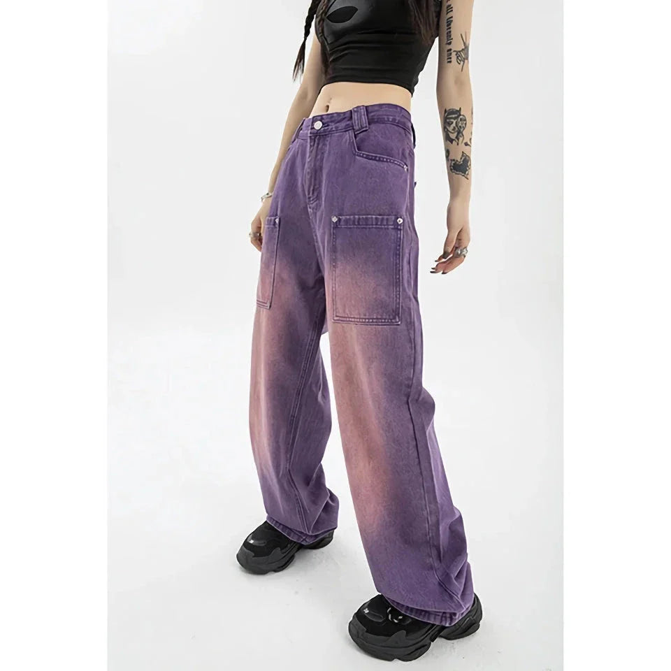 Stylish high-waist purple wide-leg jeans with elegant button details and a premium denim design