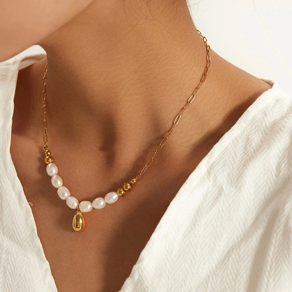 Elegant pearl pendant necklace with luxurious gold drop, a timeless accessory for any occasion