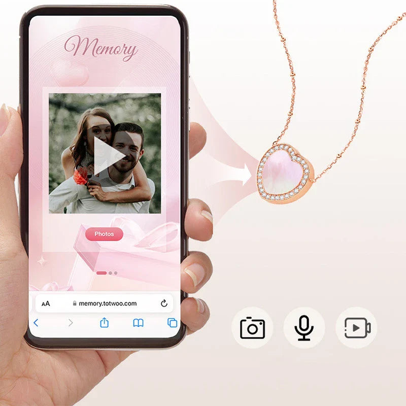 A rose gold or ice silver heart-shaped pendant necklace with an NFC chip for sending personalised digital messages