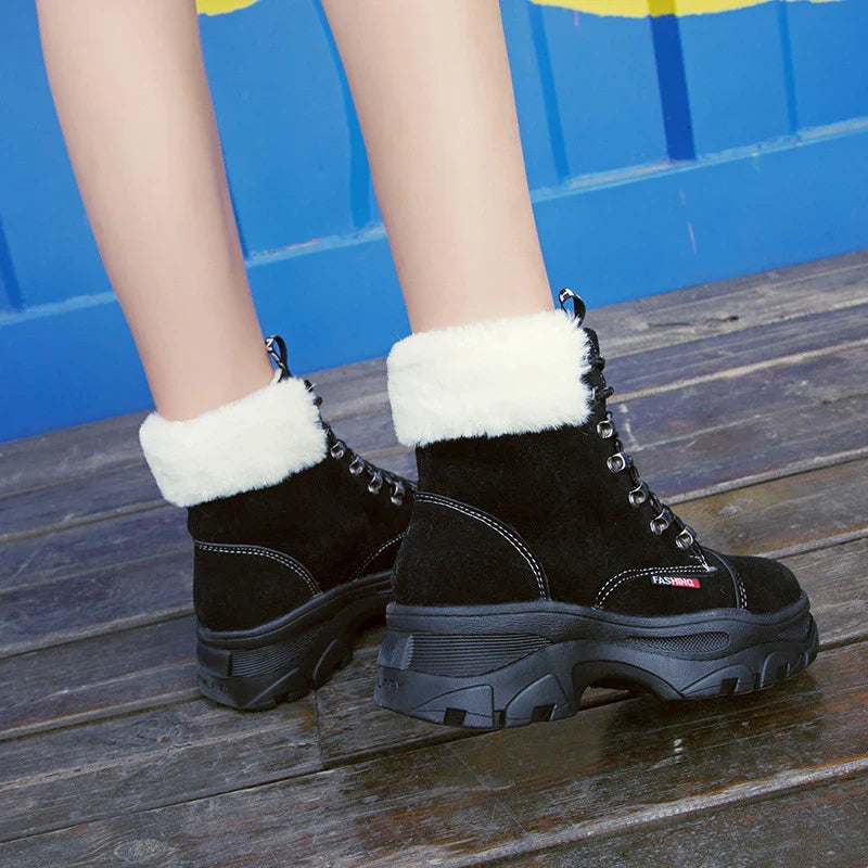 Stylish British platform boots with faux suede upper, lace-up closure, and wedge heel design