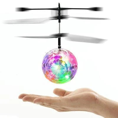 A neon-coloured LED magic hover ball floating and gliding effortlessly through the air, creating a mesmerizing visual display.