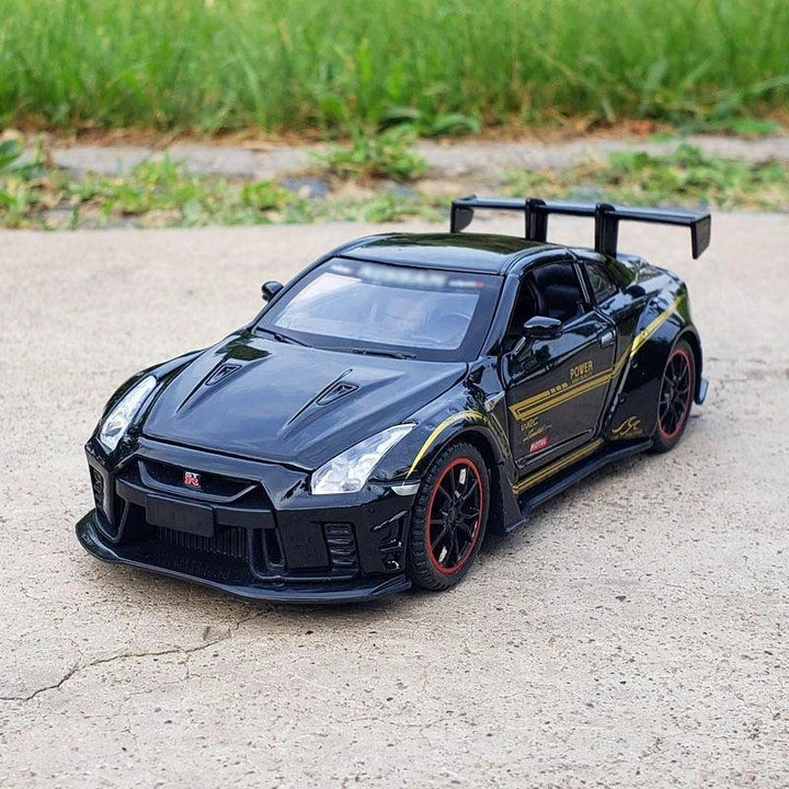 Premium 1:32 scale diecast model of the iconic Skyline R34 and R35 sports car, featuring detailed construction, interactive elements, and authentic design.